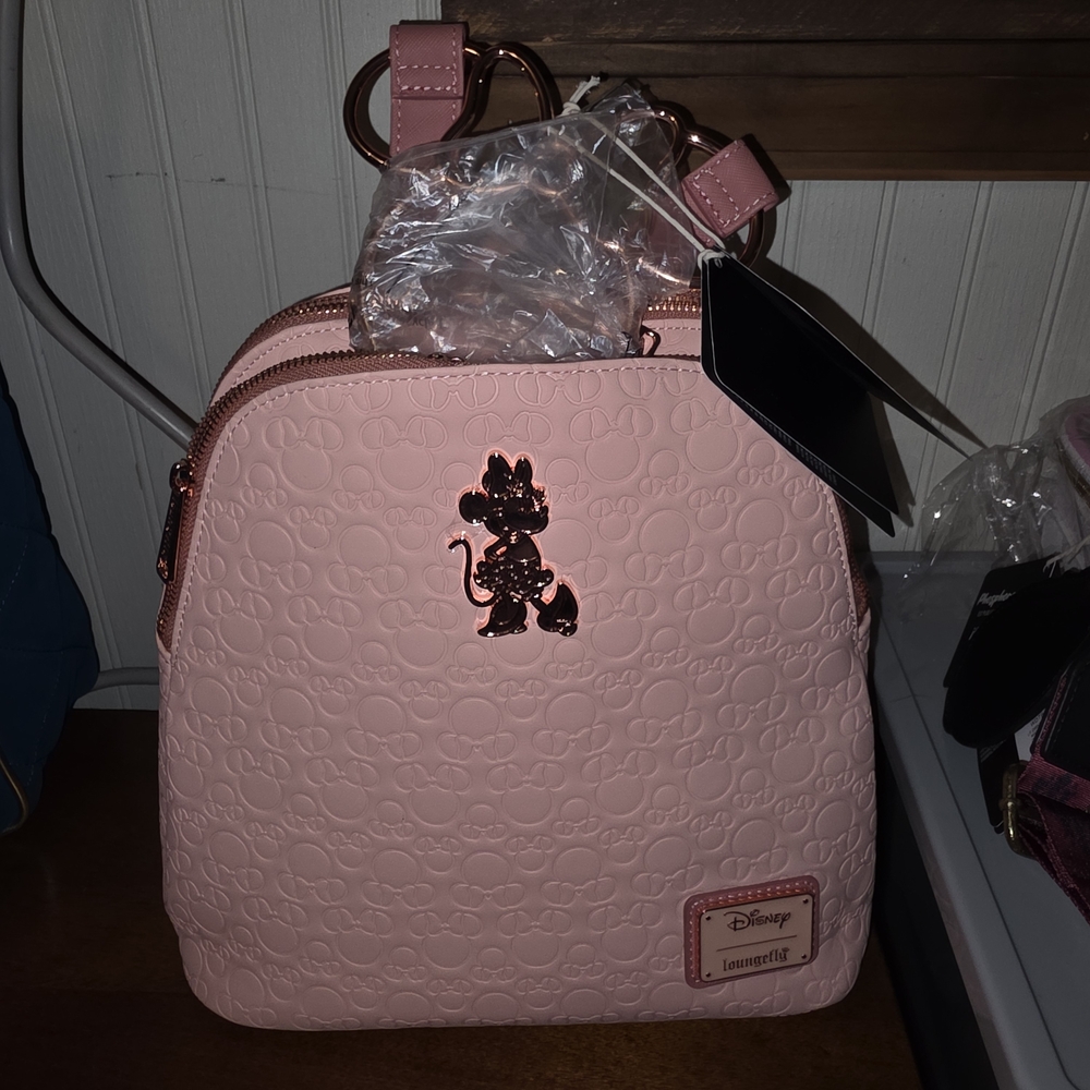 Loungefly Pink Embossed Backpack with Disney Character